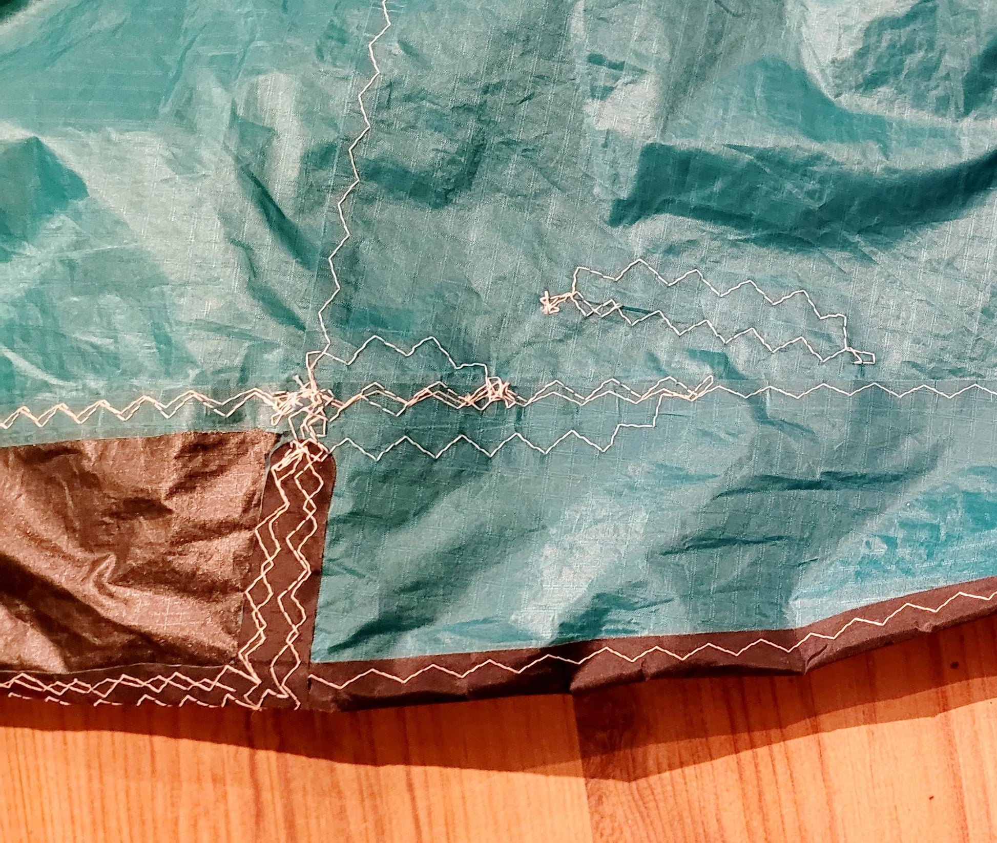 north-reach-9m2-gron-kite-only-lagning-duk-liten-gron-insida-2-kiteboardcenter-kite-och-wingbutiken